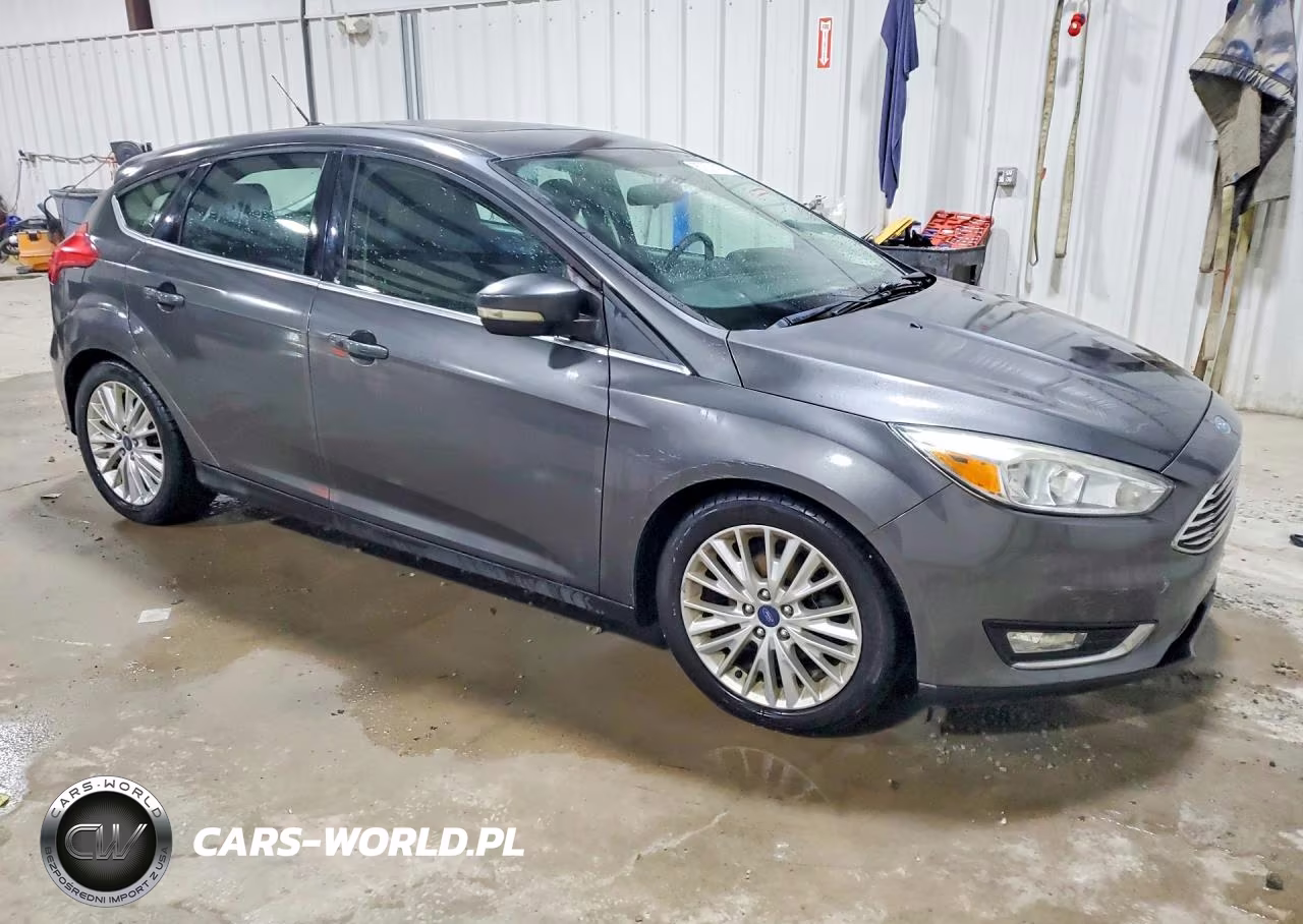 2015 Ford Focus Titanium VIN:1FADP3N2XFL238864 - 4
