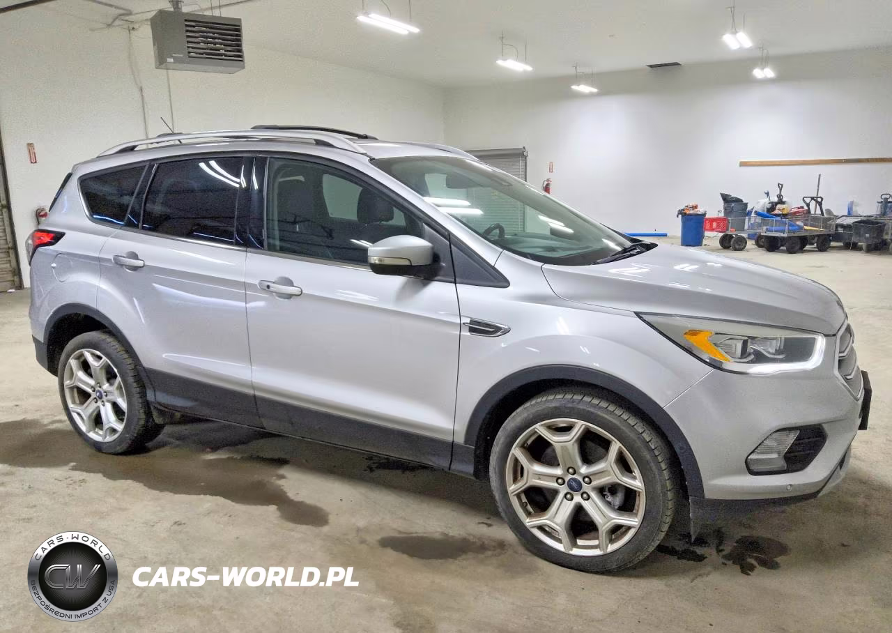 2017 Ford Escape Titanium VIN:1FMCU9J90HUB77280 - 4