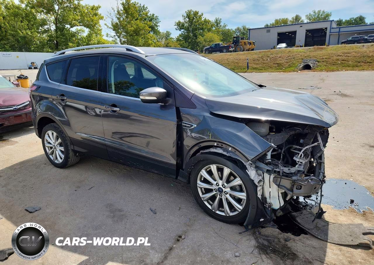 2017 Ford Escape Titanium VIN:1FMCU0JD9HUE06703 - 4