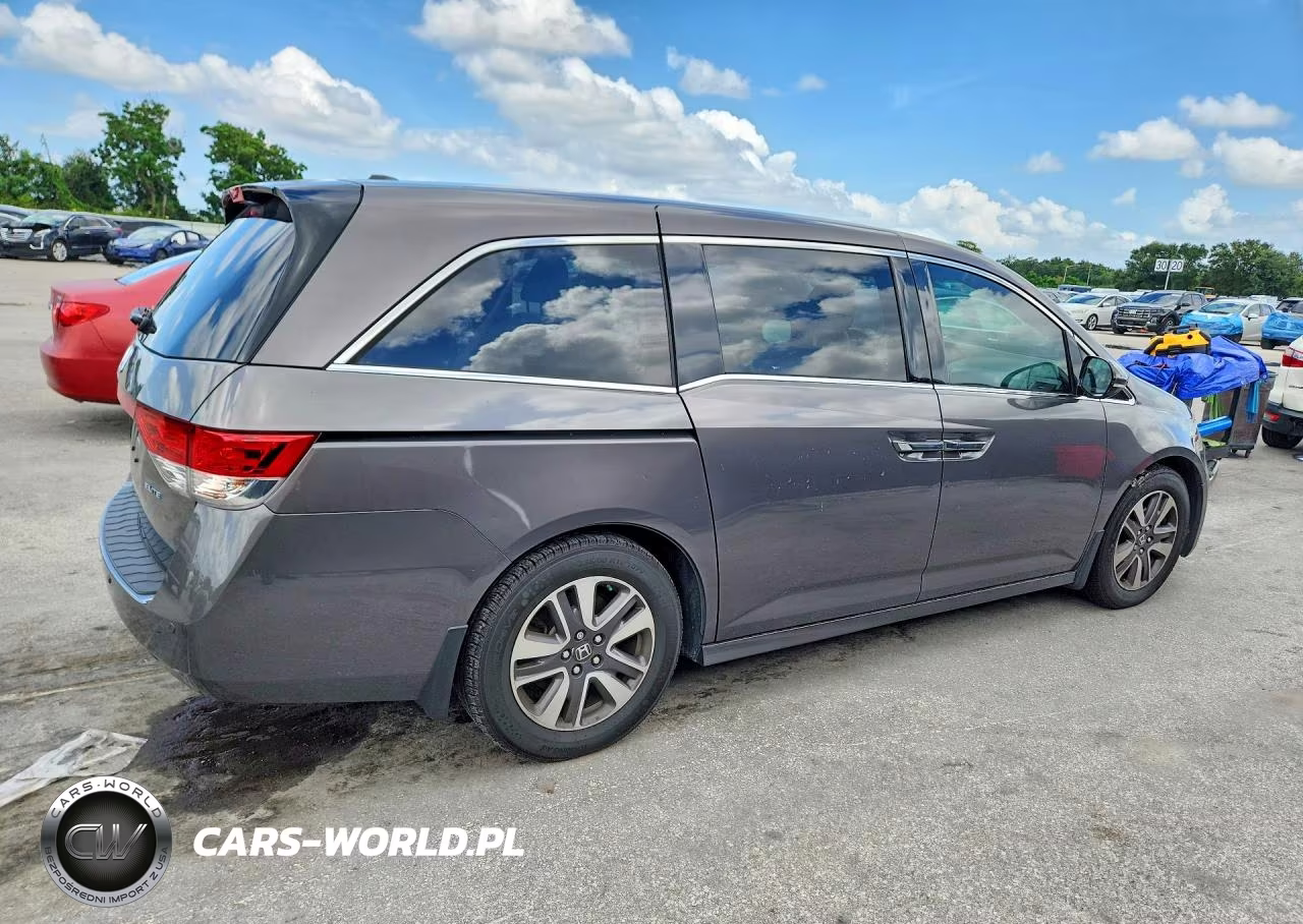 2014 Honda Odyssey Touring VIN:5FNRL5H97EB124676 - 3