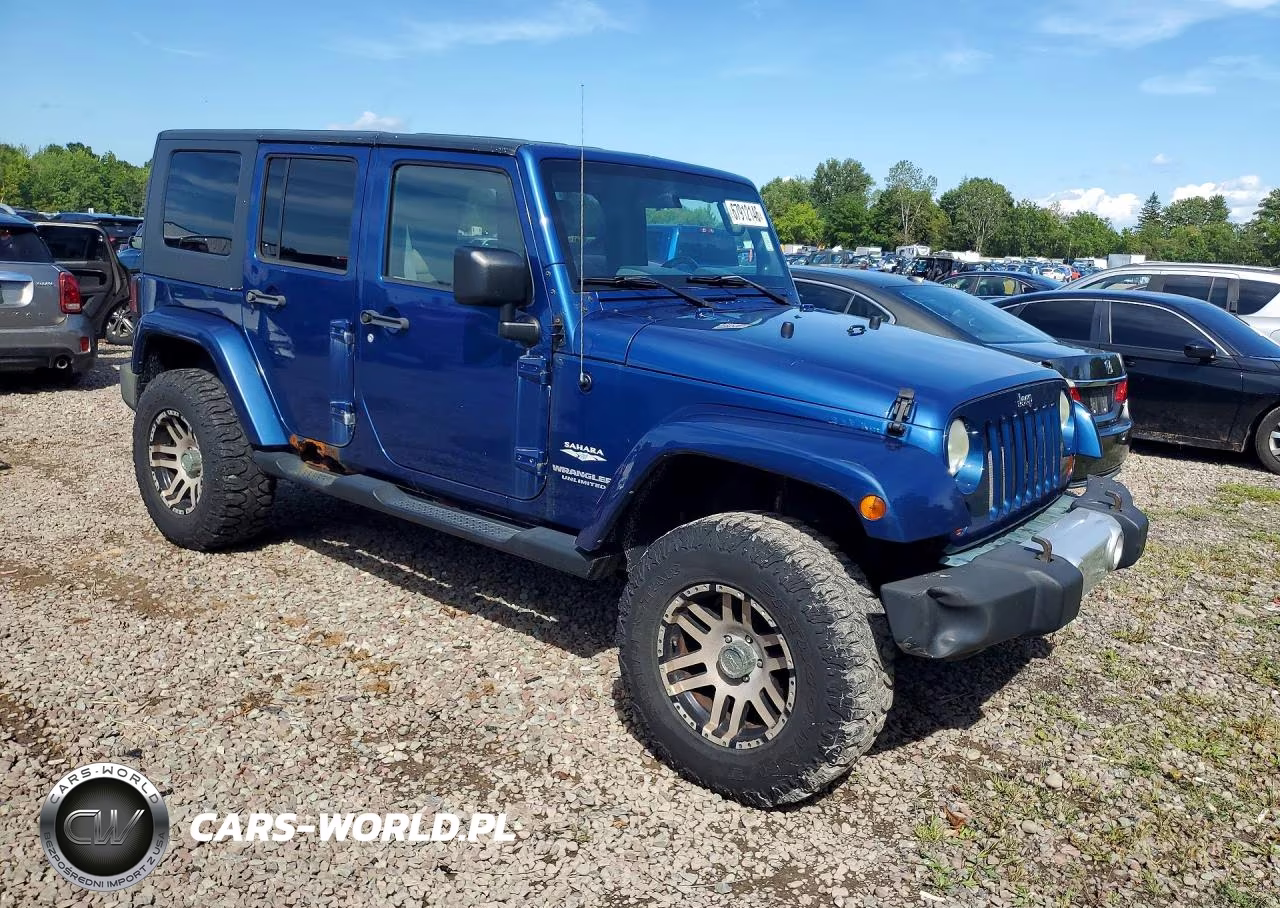 2010 Jeep Wrangler Unlimited Sahara VIN:1J4BA5H14AL122645 - 4