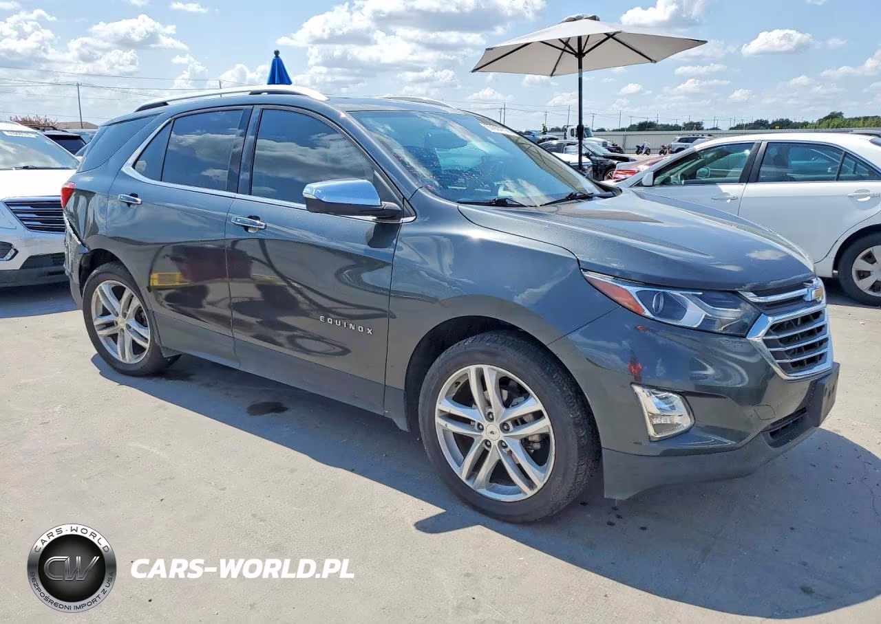 2018 Chevrolet Equinox Premier VIN:2GNAXMEV7J6101810 - 4