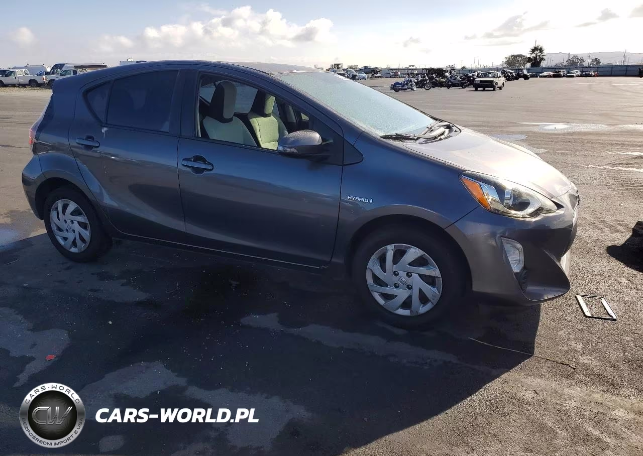 2015 Toyota Prius C One VIN:JTDKDTB36F1584980 - 4