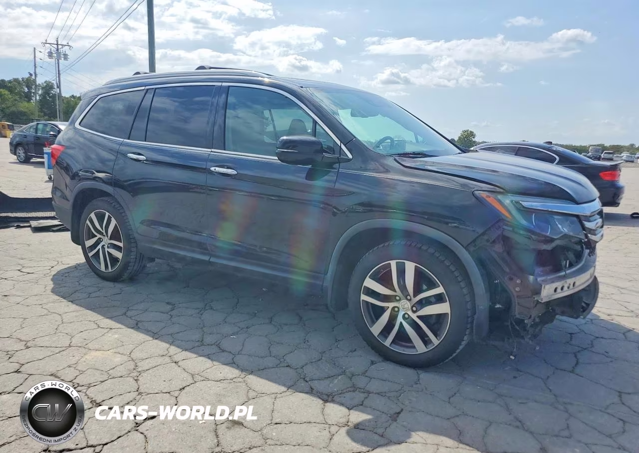 2016 Honda Pilot Elite VIN:5FNYF6H01GB102816 - 4