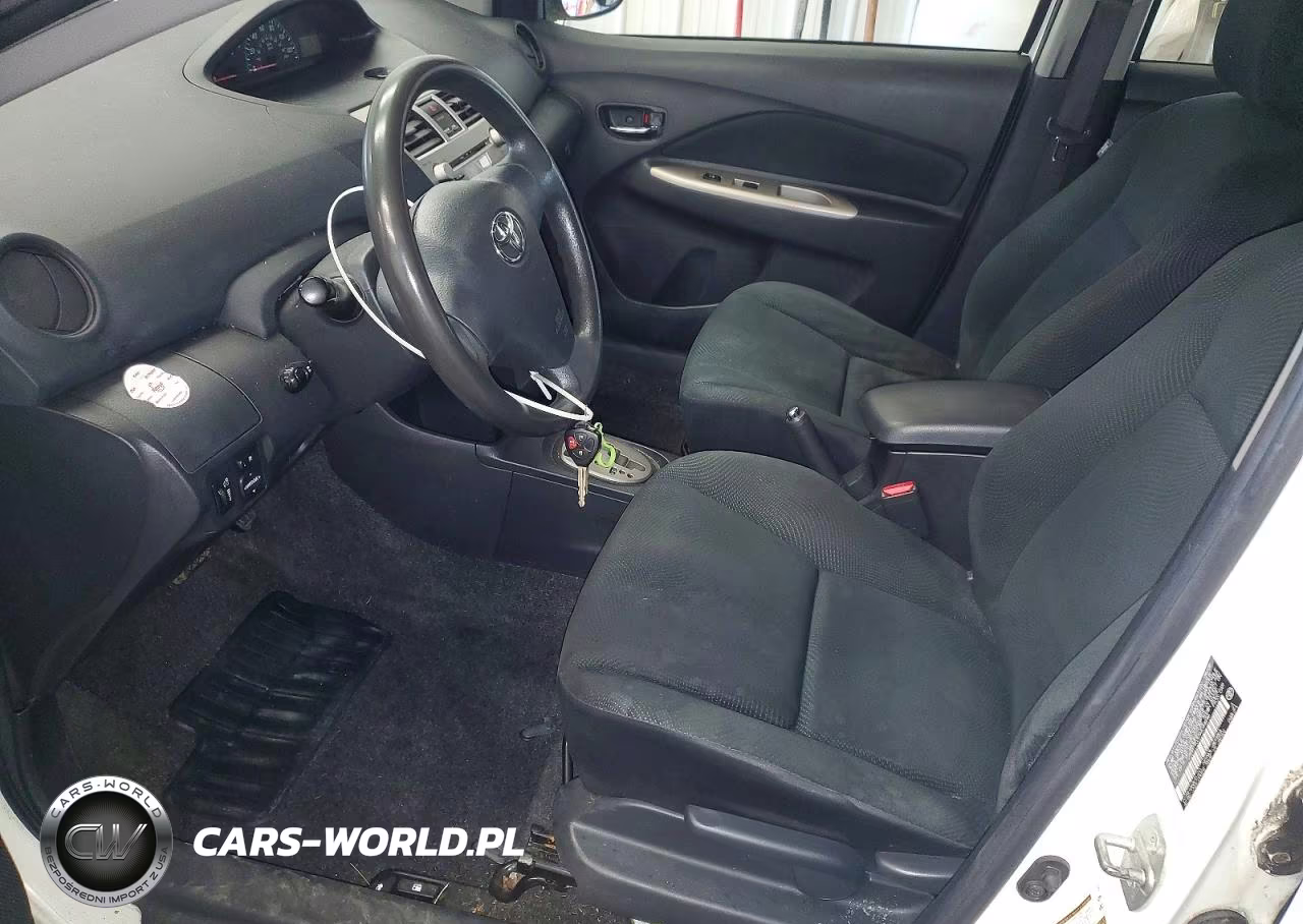 2009 Toyota Yaris Base VIN:JTDBT903094044696 - 7