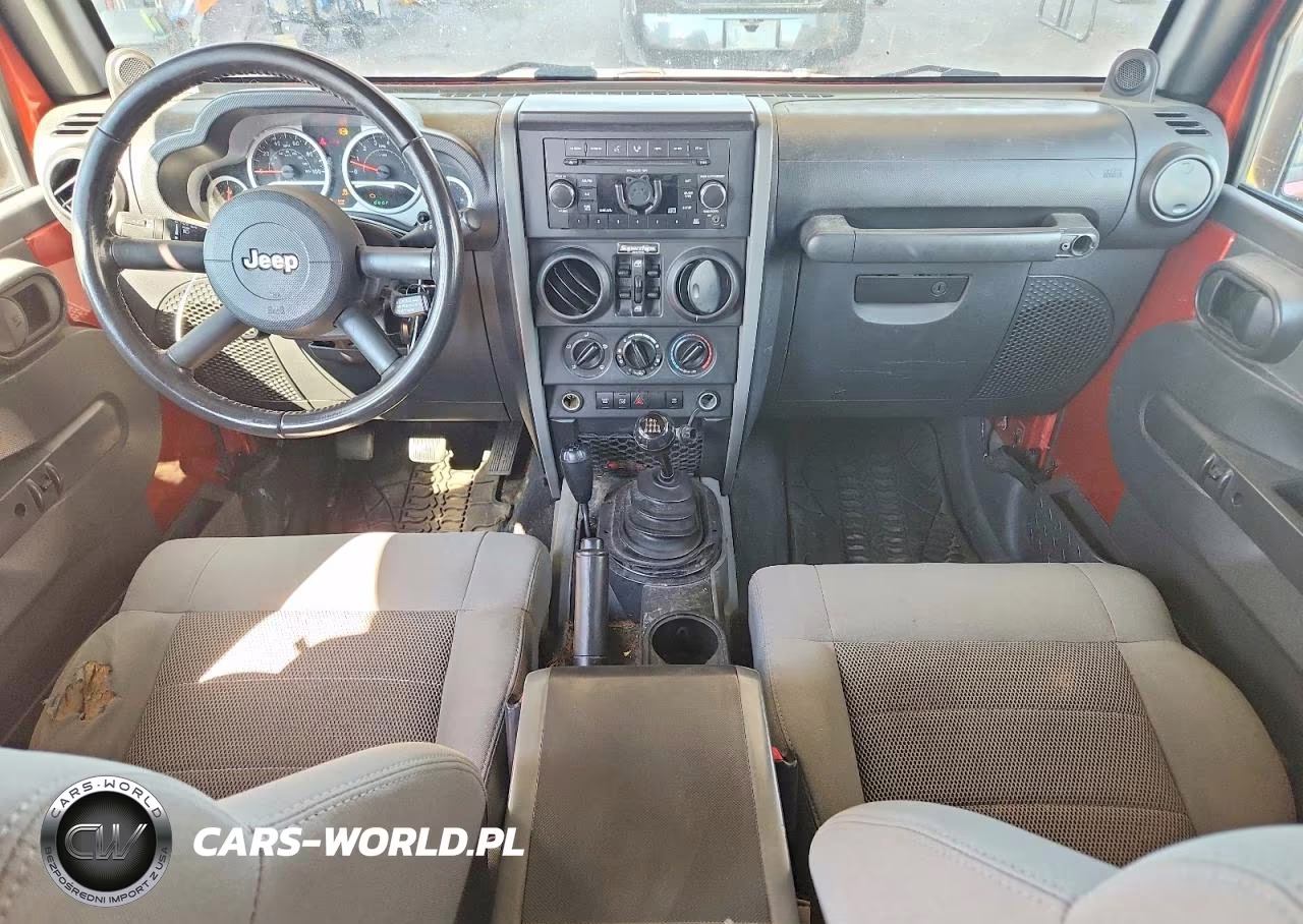 2009 Jeep Wrangler Unlimited Rubicon VIN:1J4GA691X9L749677 - 8