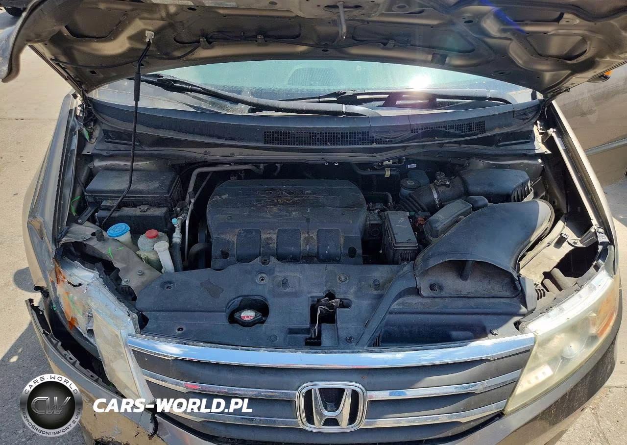 2012 Honda Odyssey Touring VIN:5FNRL5H95CB063860 - 12