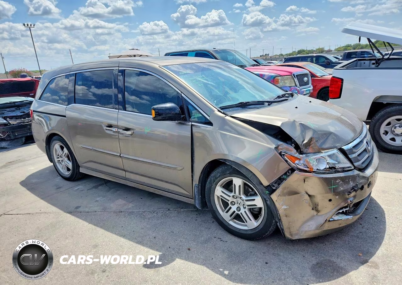 2012 Honda Odyssey Touring VIN:5FNRL5H95CB063860 - 4
