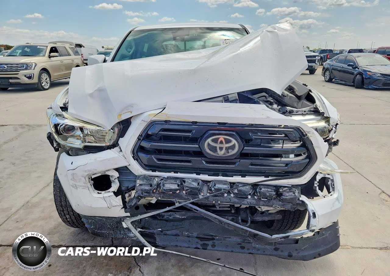 2018 Toyota Tacoma Sr VIN:5TFAX5GN0JX113101 - 5