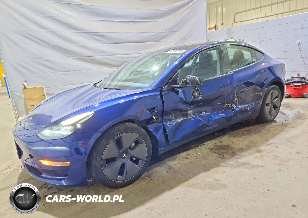 2023 Tesla Model 3 VIN:5YJ3E1EB7PF694289 - 1