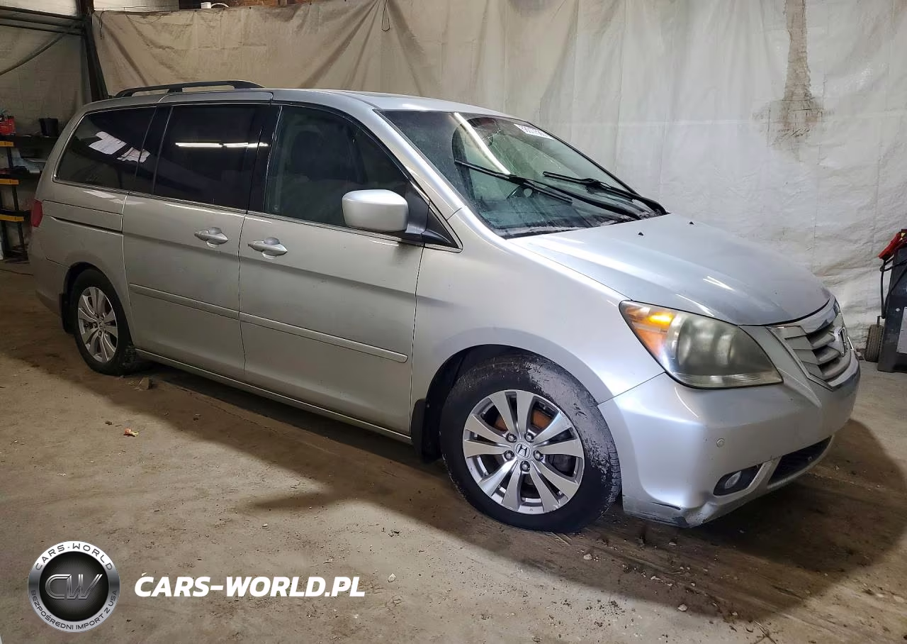 2010 Honda Odyssey Touring VIN:5FNRL3H99AB090111 - 4