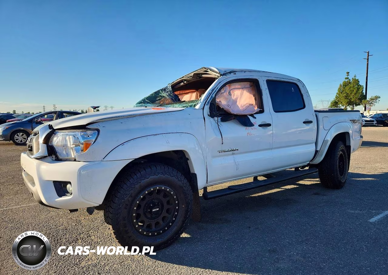 2015 Toyota Tacoma V6 VIN:3TMLU4EN2FM169603 - 1