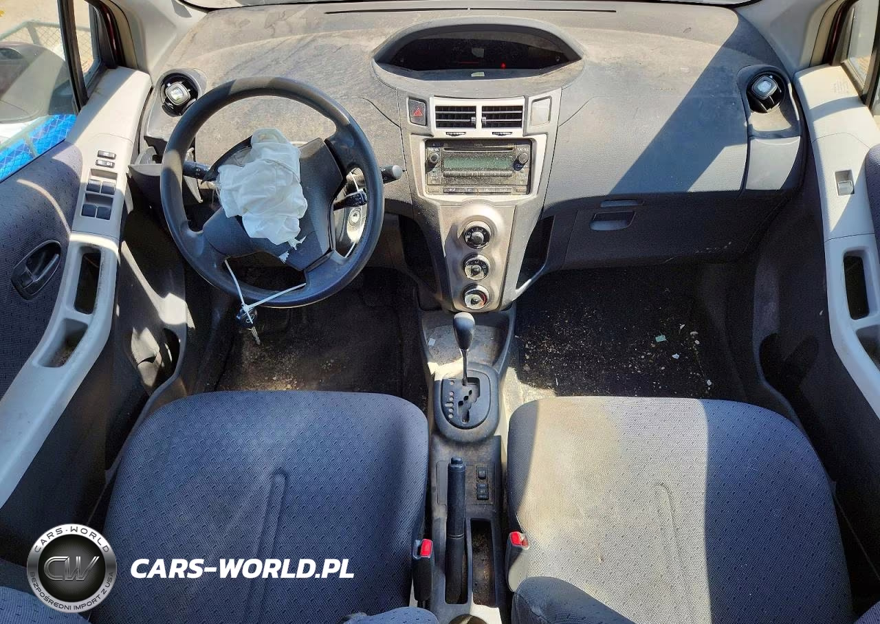 2009 Toyota Yaris Base VIN:JTDKT903795259406 - 8