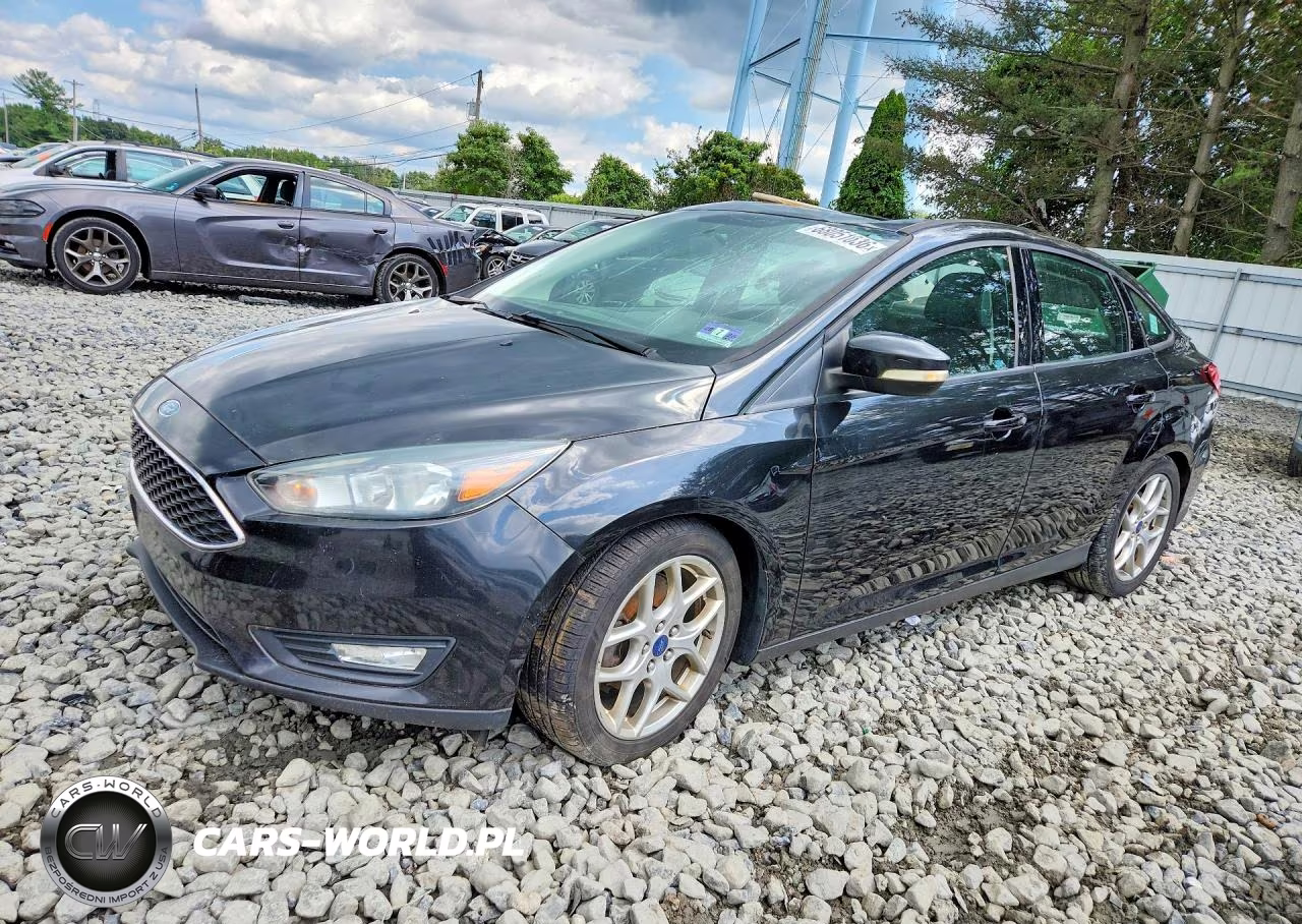 2015 Ford Focus Se VIN:1FADP3F24FL353250 - 1