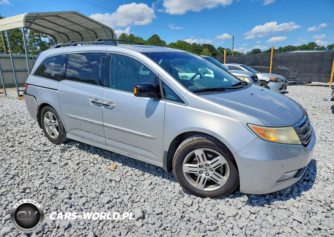 2011 Honda Odyssey Touring VIN:5FNRL5H97BB041194 - 4