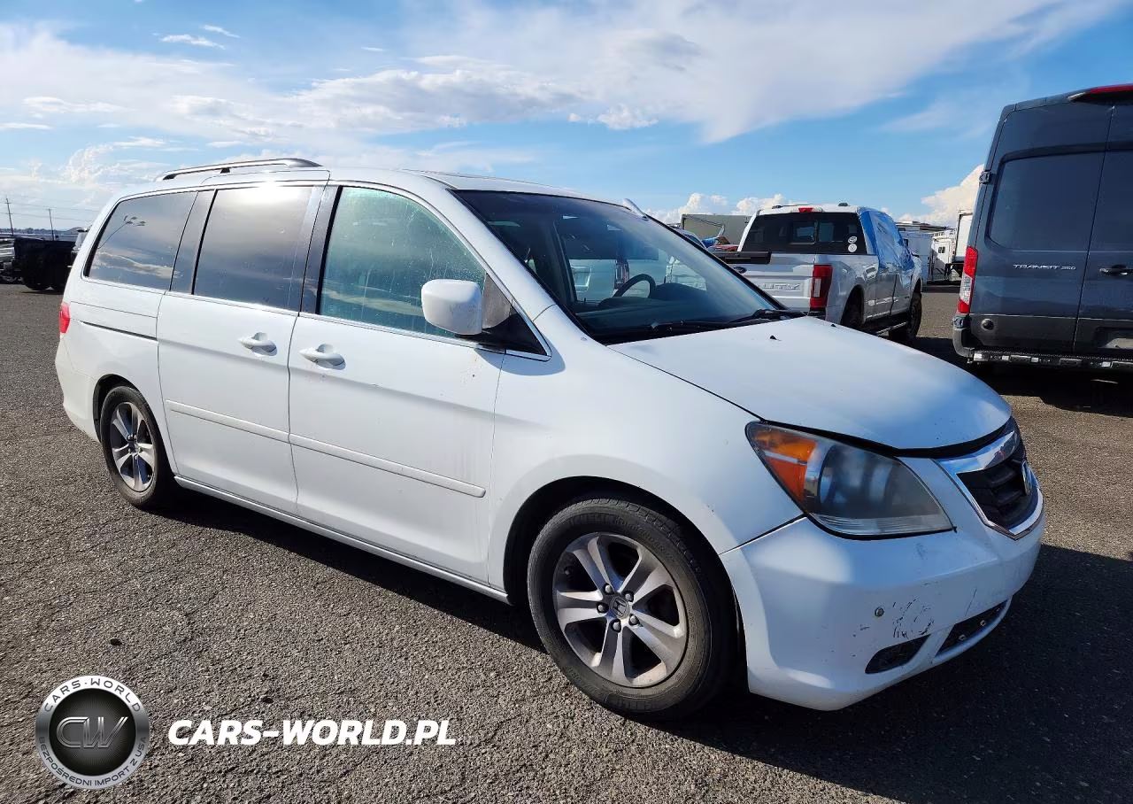 2010 Honda Odyssey Touring VIN:5FNRL3H92AB074736 - 4