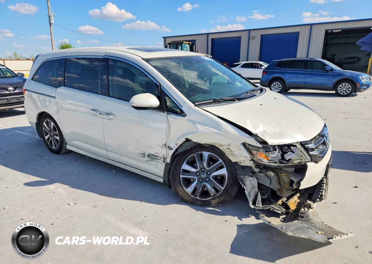 2014 Honda Odyssey Touring VIN:5FNRL5H96EB135488 - 4