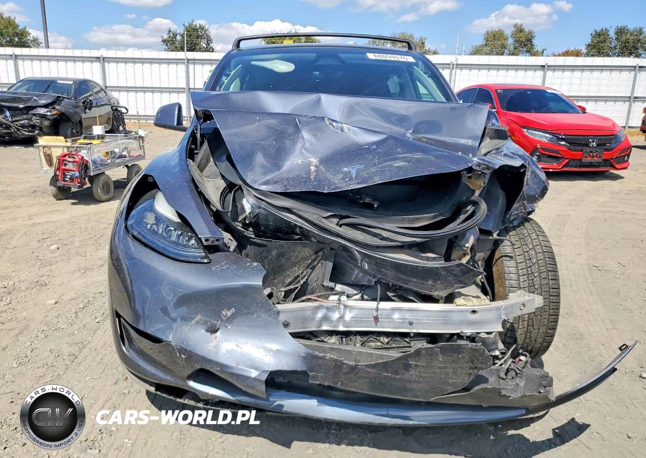2023 Tesla Model Y VIN:7SAYGAEE2PF865561 - 5
