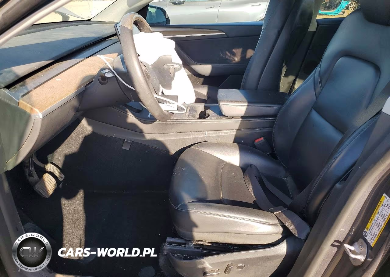 2023 Tesla Model Y VIN:7SAYGAEE2PF865561 - 7