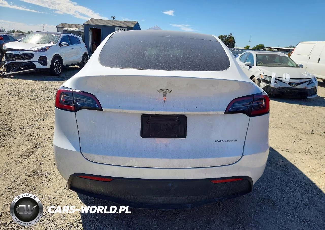 2023 Tesla Model Y VIN:7SAYGDEE2PF671002 - 6