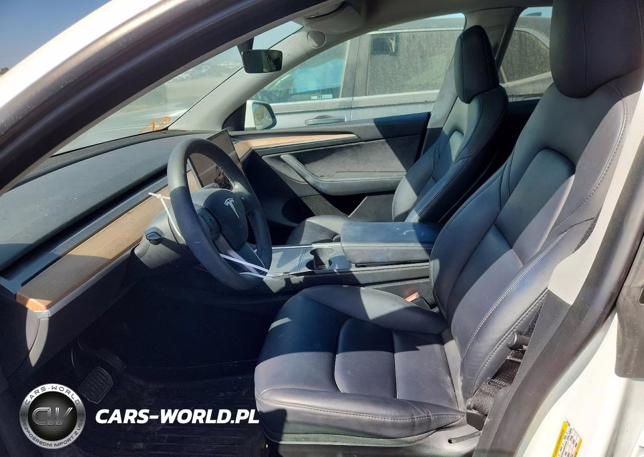 2023 Tesla Model Y VIN:7SAYGDEE2PF671002 - 7