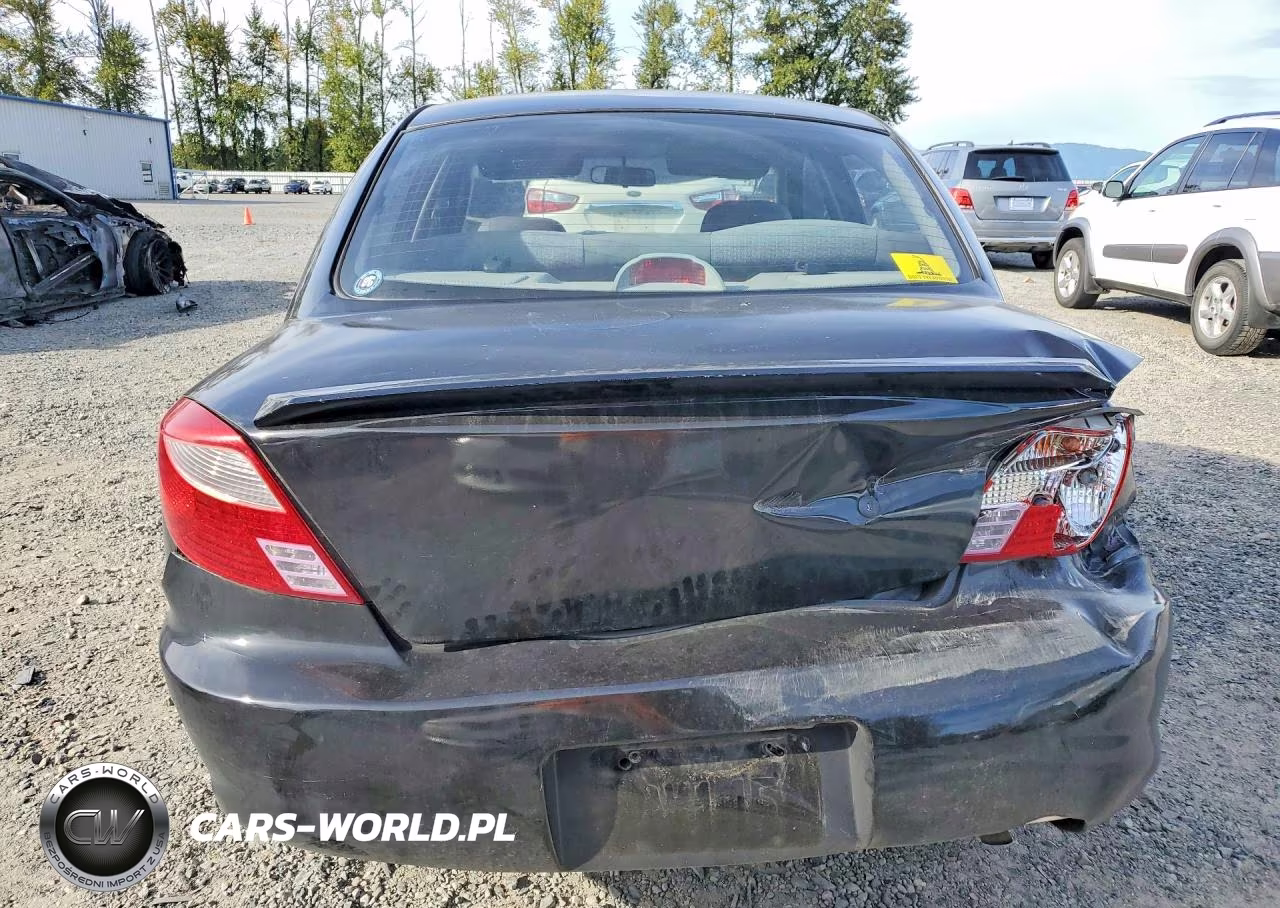 2002 Kia Rio Base VIN:KNADC123126095297 - 6