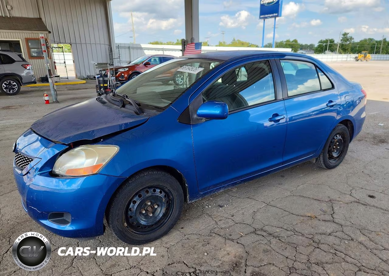 2009 Toyota Yaris Base VIN:JTDBT903991310833 - 1