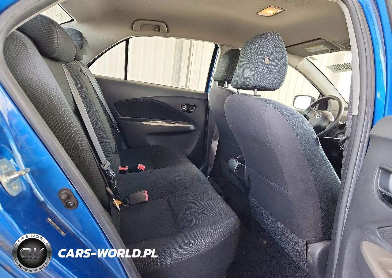 2009 Toyota Yaris Base VIN:JTDBT903991310833 - 10
