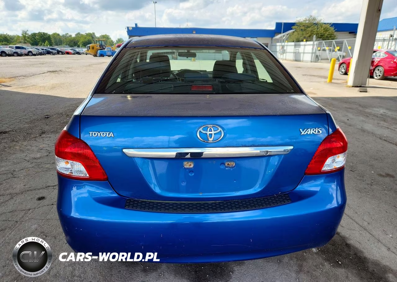 2009 Toyota Yaris Base VIN:JTDBT903991310833 - 6