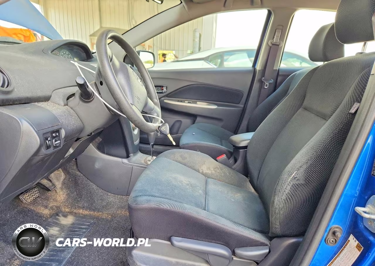 2009 Toyota Yaris Base VIN:JTDBT903991310833 - 7