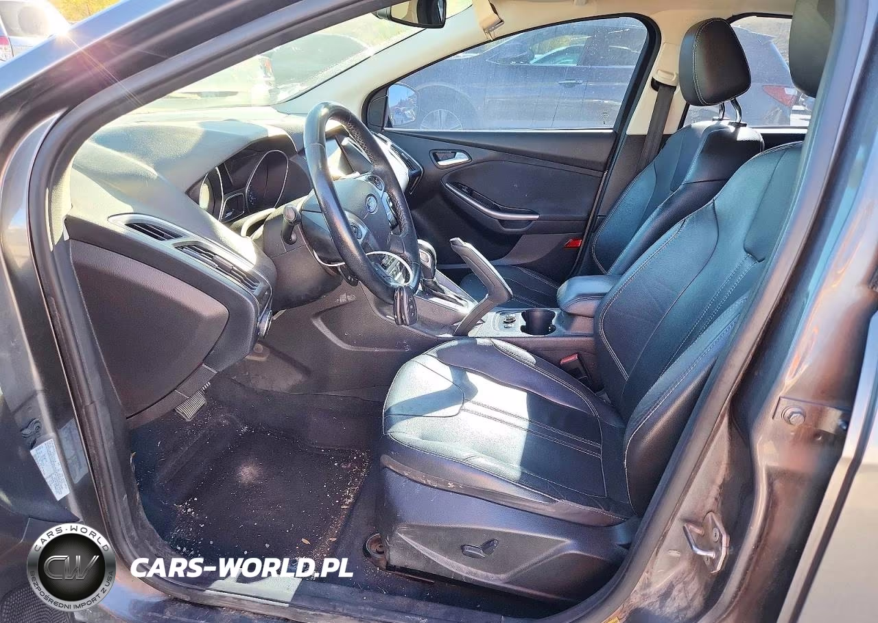 2012 Ford Focus Titanium VIN:1FAHP3N27CL314943 - 7