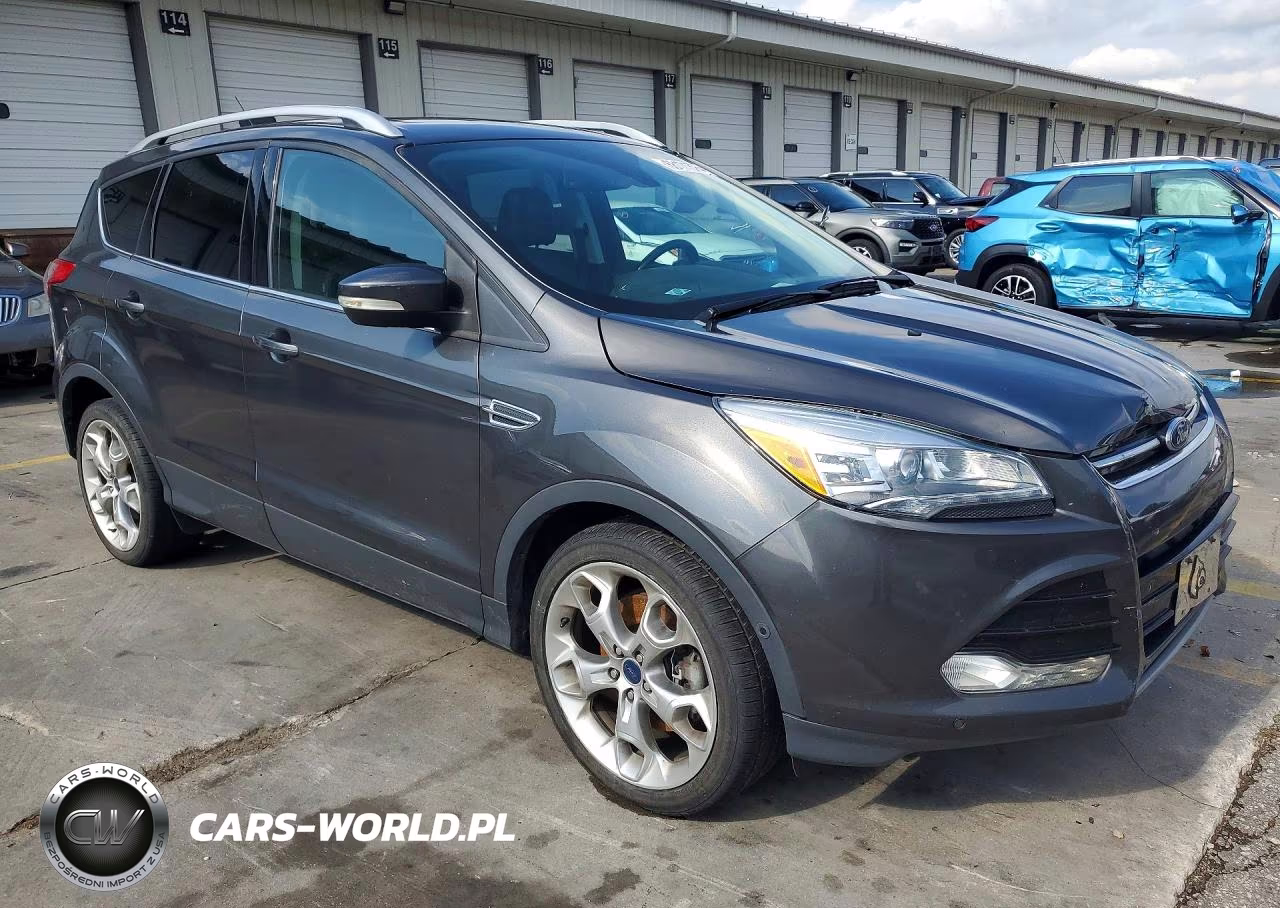 2016 Ford Escape Titanium VIN:1FMCU9J92GUB55831 - 4