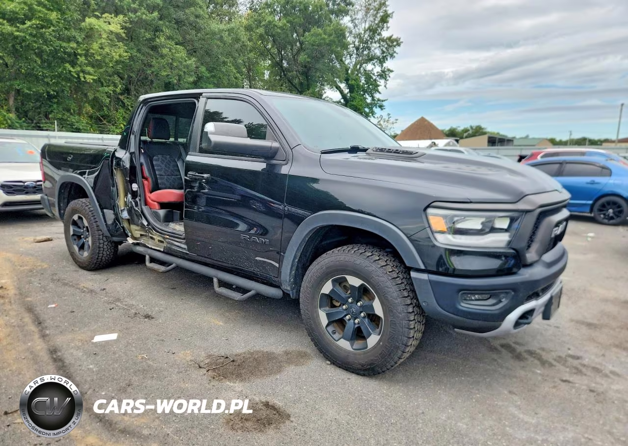 2019 Ram 1500 Rebel VIN:1C6SRFLT8KN734566 - 4