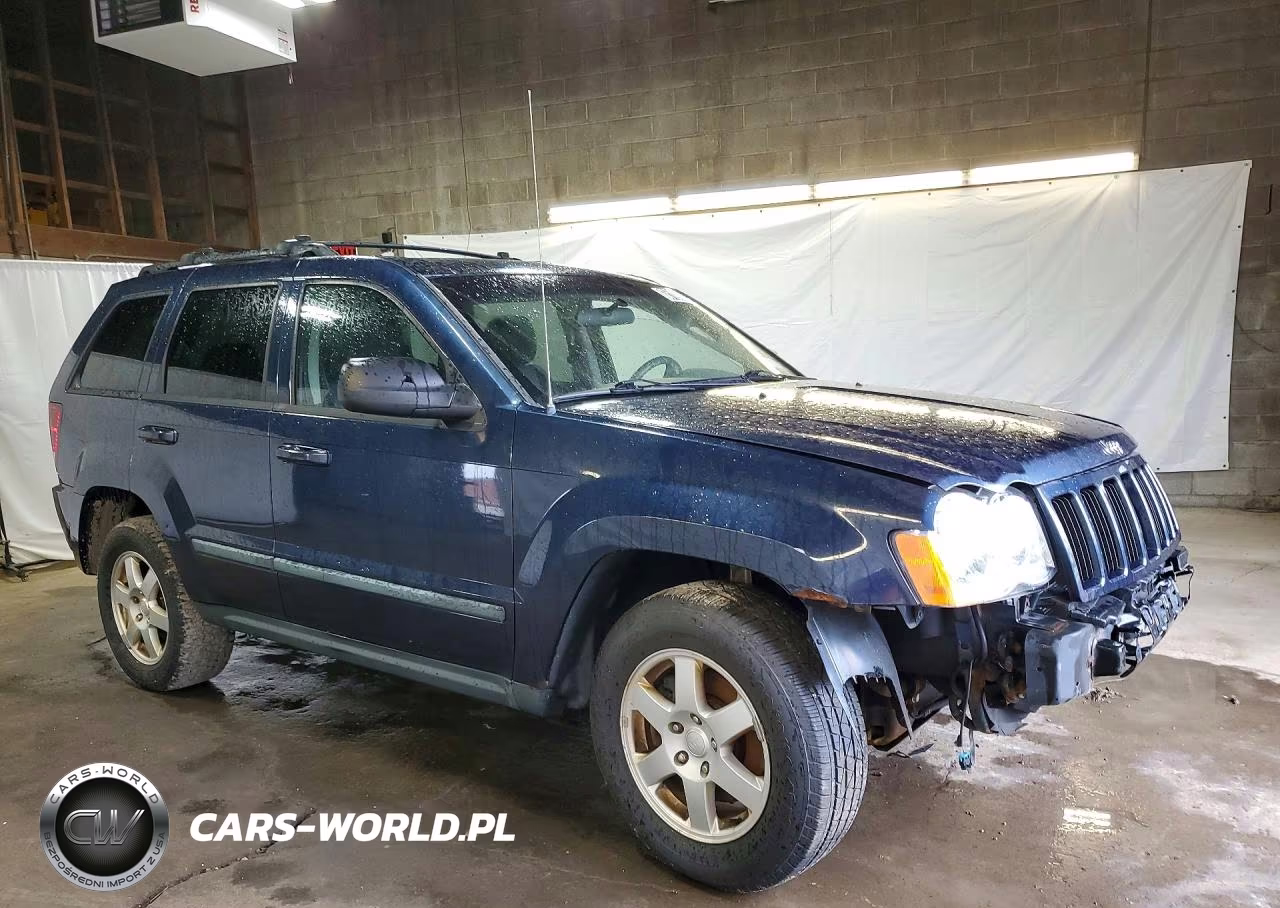 2009 Jeep Grand Cherokee Laredo VIN:1J8GR48K39C527990 - 4