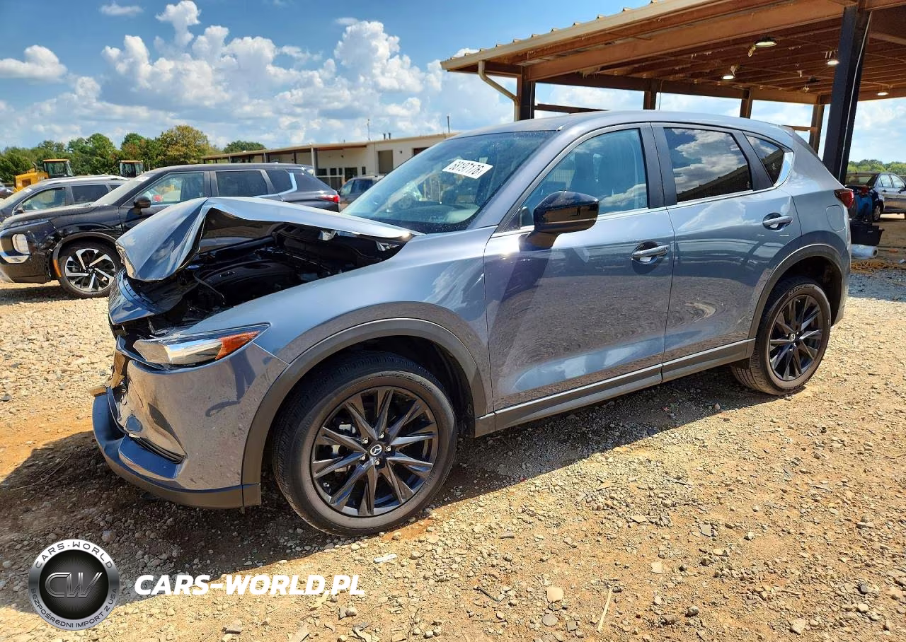 2021 Mazda Cx-5 Touring VIN:JM3KFACM1M0409164 - 1
