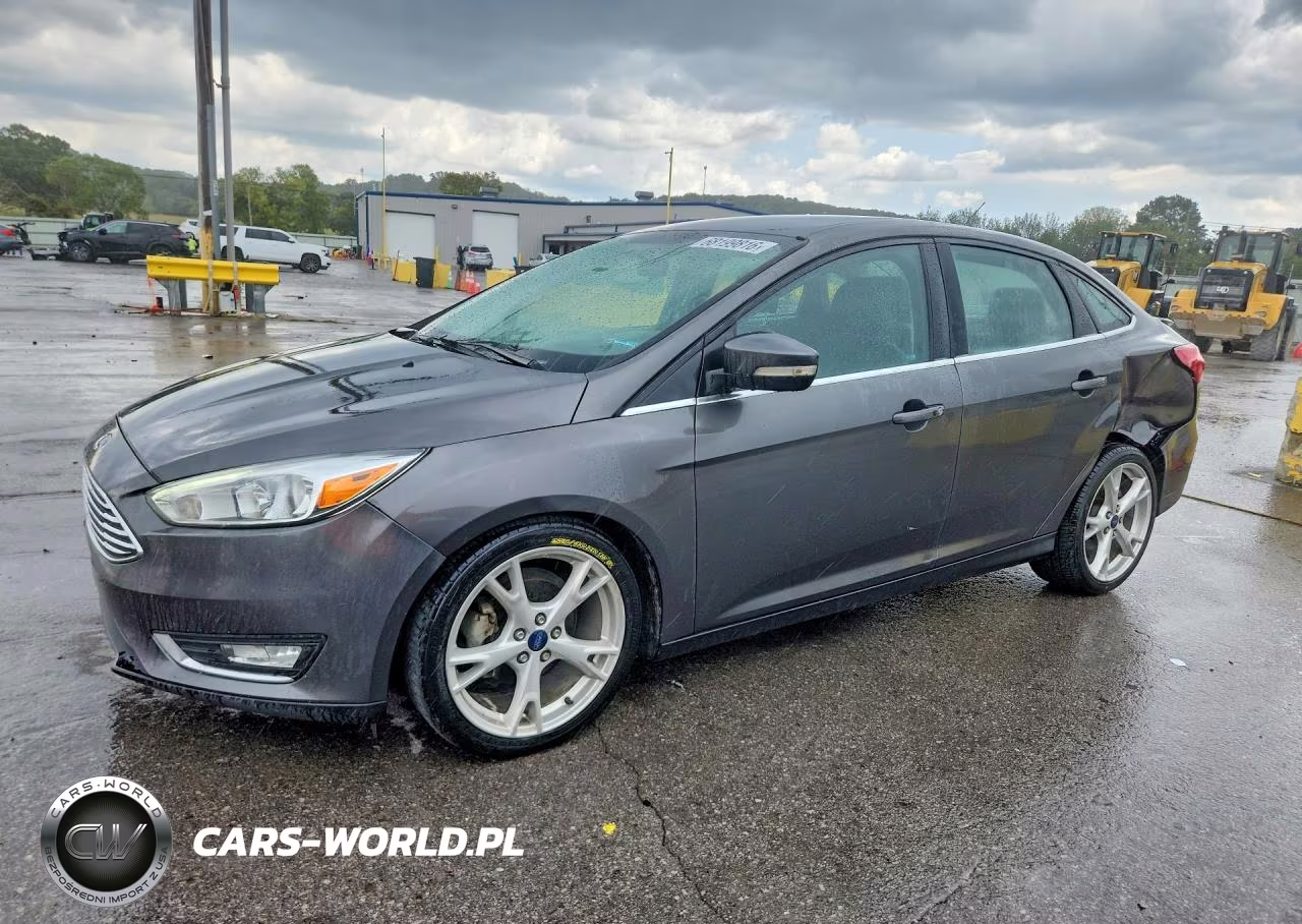 2016 Ford Focus Titanium VIN:1FADP3J25GL249567 - 1