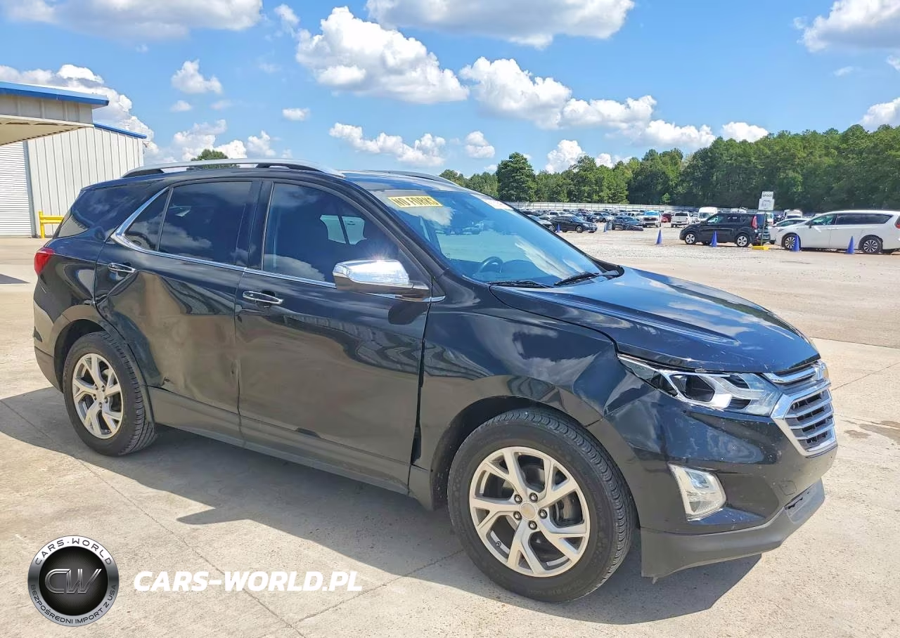 2018 Chevrolet Equinox Premier VIN:2GNAXVEV1J6321692 - 4