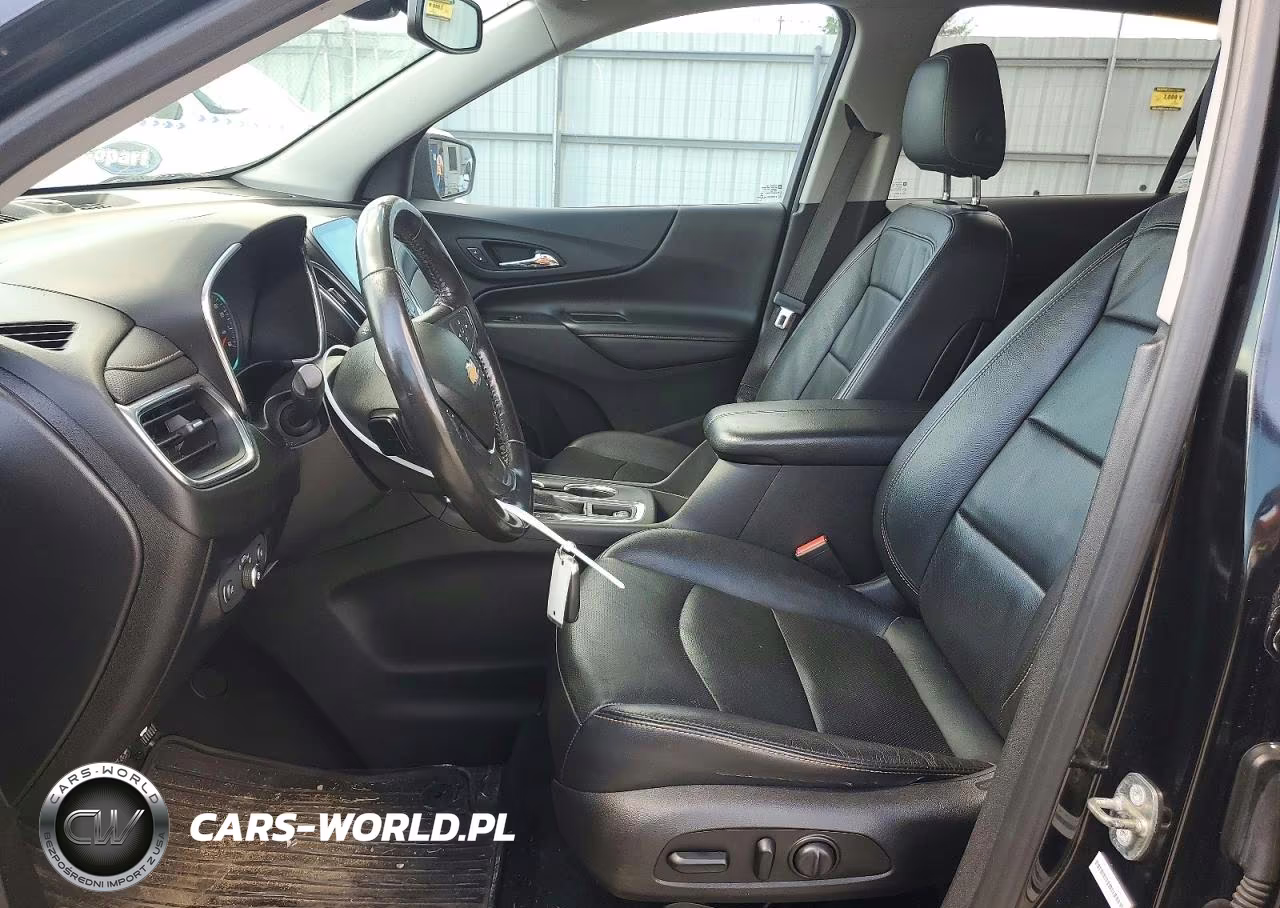 2018 Chevrolet Equinox Premier VIN:2GNAXVEV1J6321692 - 7