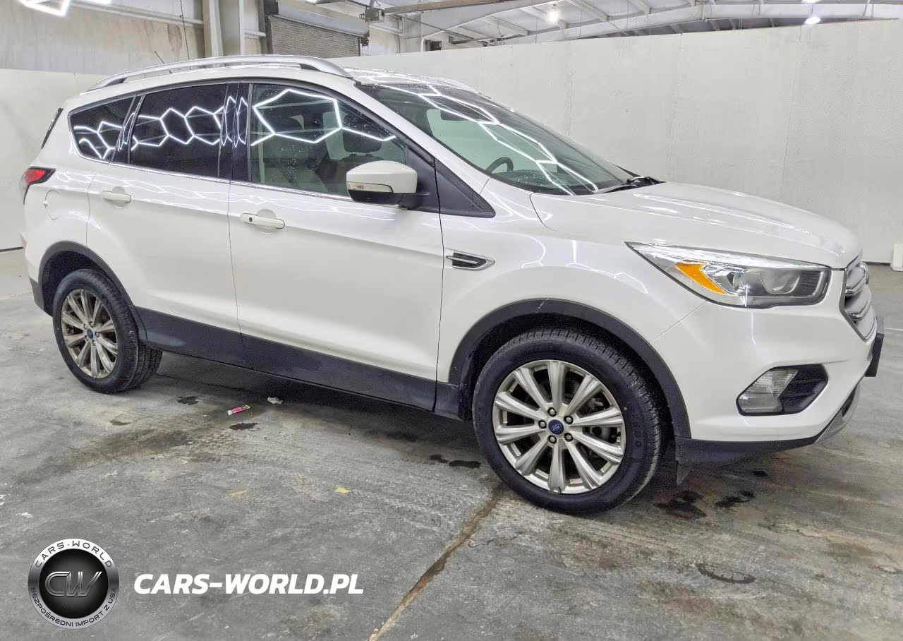 2017 Ford Escape Titanium VIN:1FMCU9J90HUE72590 - 4