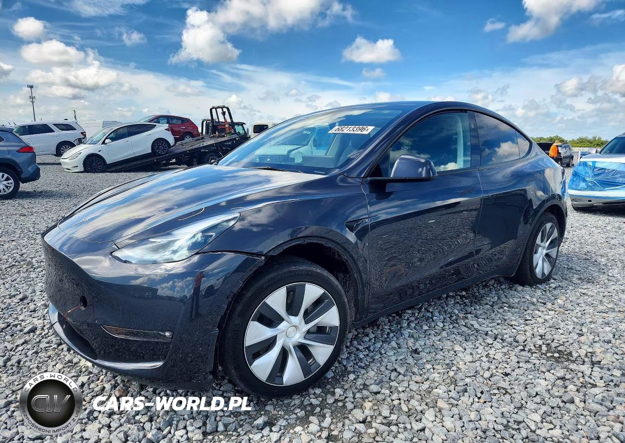 2024 Tesla Model Y VIN:7SAYGDEE4RF032767 - 1