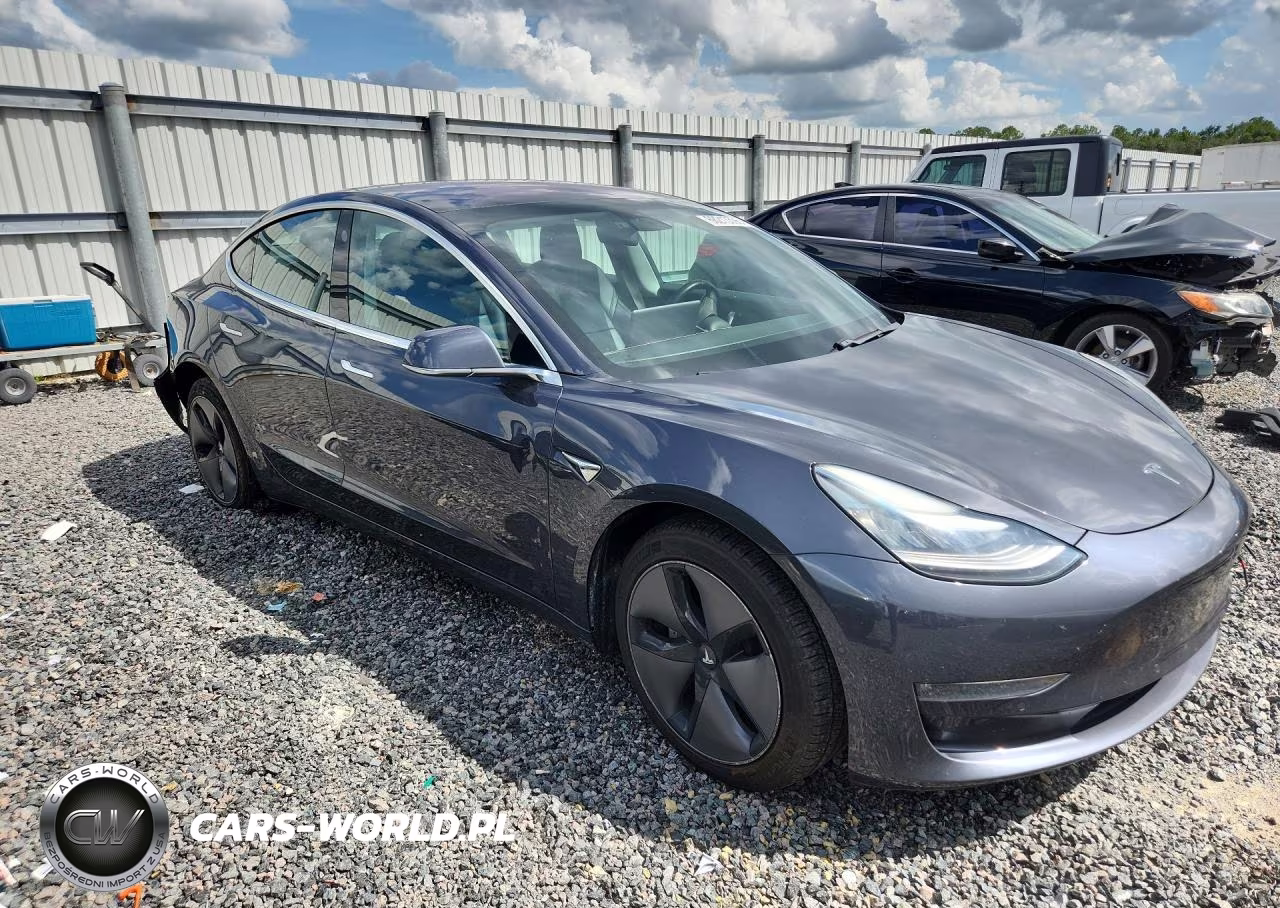 2018 Tesla Model 3 VIN:5YJ3E1EB4JF128551 - 4