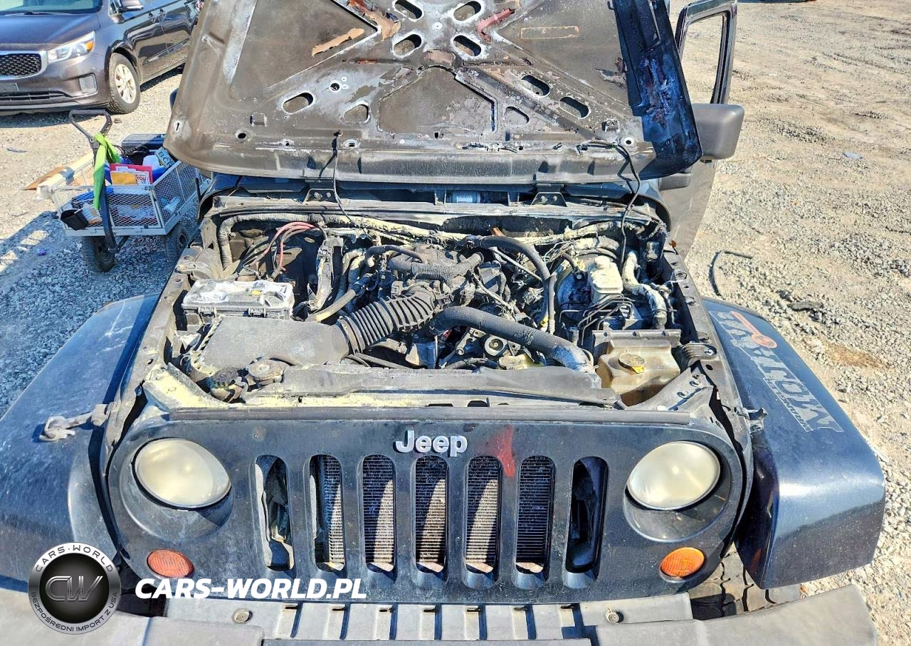 2011 Jeep Wrangler Unlimited Sport VIN:1J4BA3H16BL621999 - 12