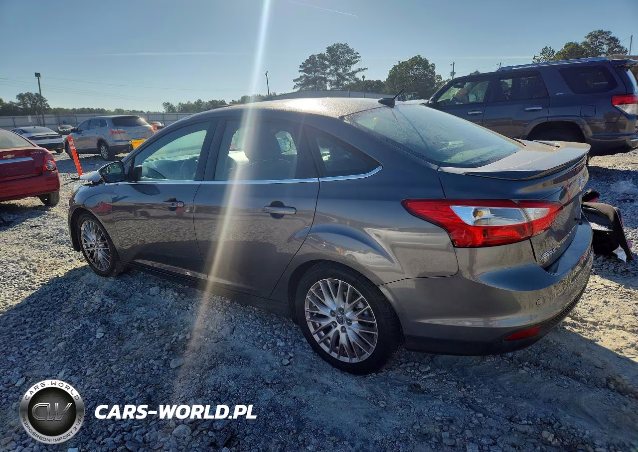 2014 Ford Focus Titanium VIN:1FADP3J20EL338931 - 2