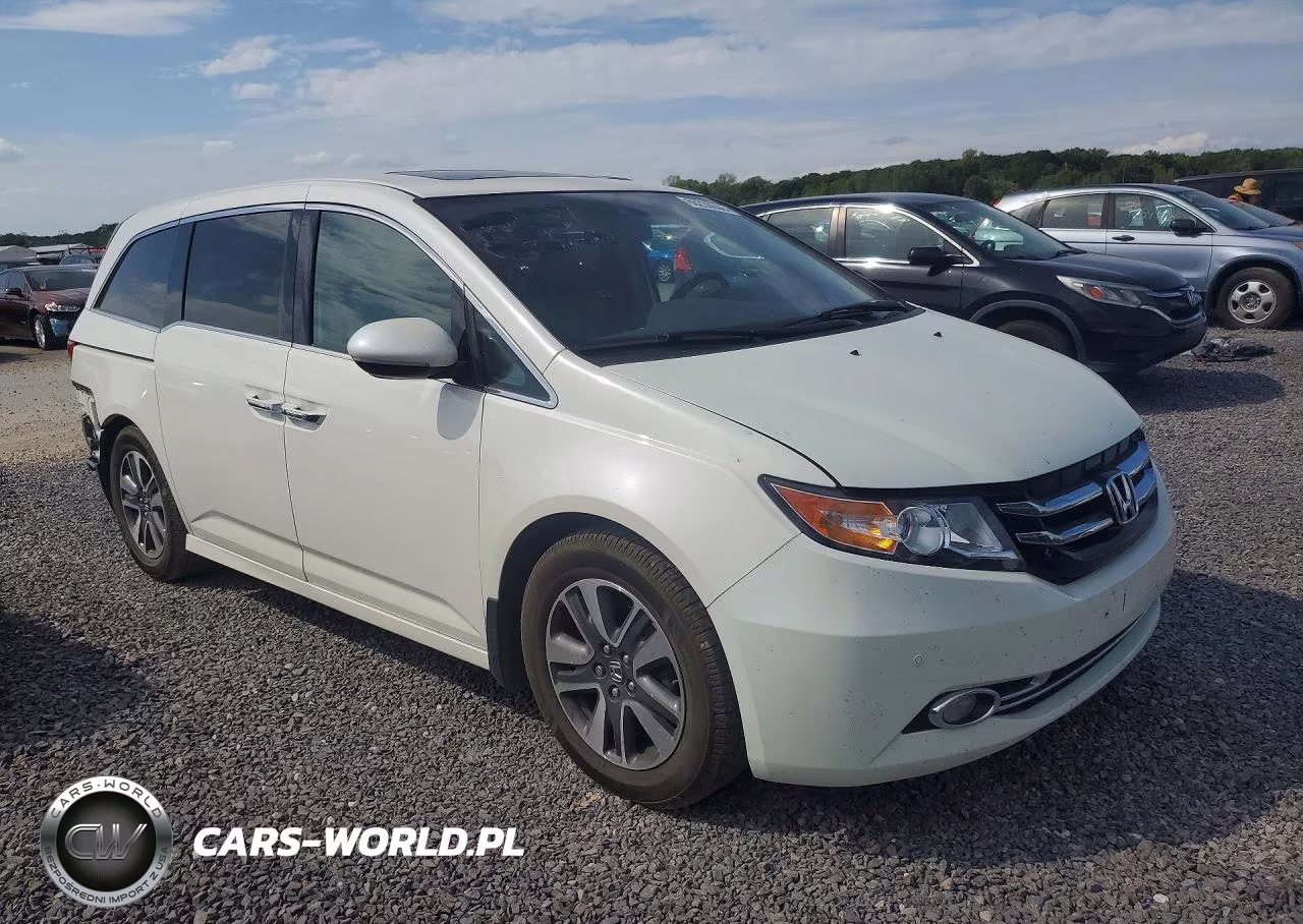 2015 Honda Odyssey Touring VIN:5FNRL5H92FB057647 - 4