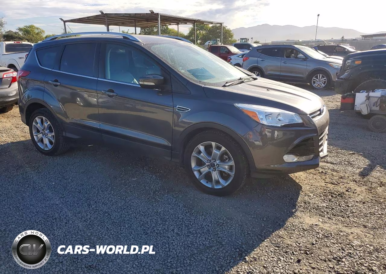 2015 Ford Escape Titanium VIN:1FMCU0J96FUC12896 - 4