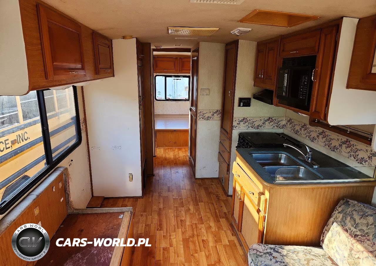 1998 Fleetwood Storm Rv VIN:1GBKP37J1W3308553 - 9