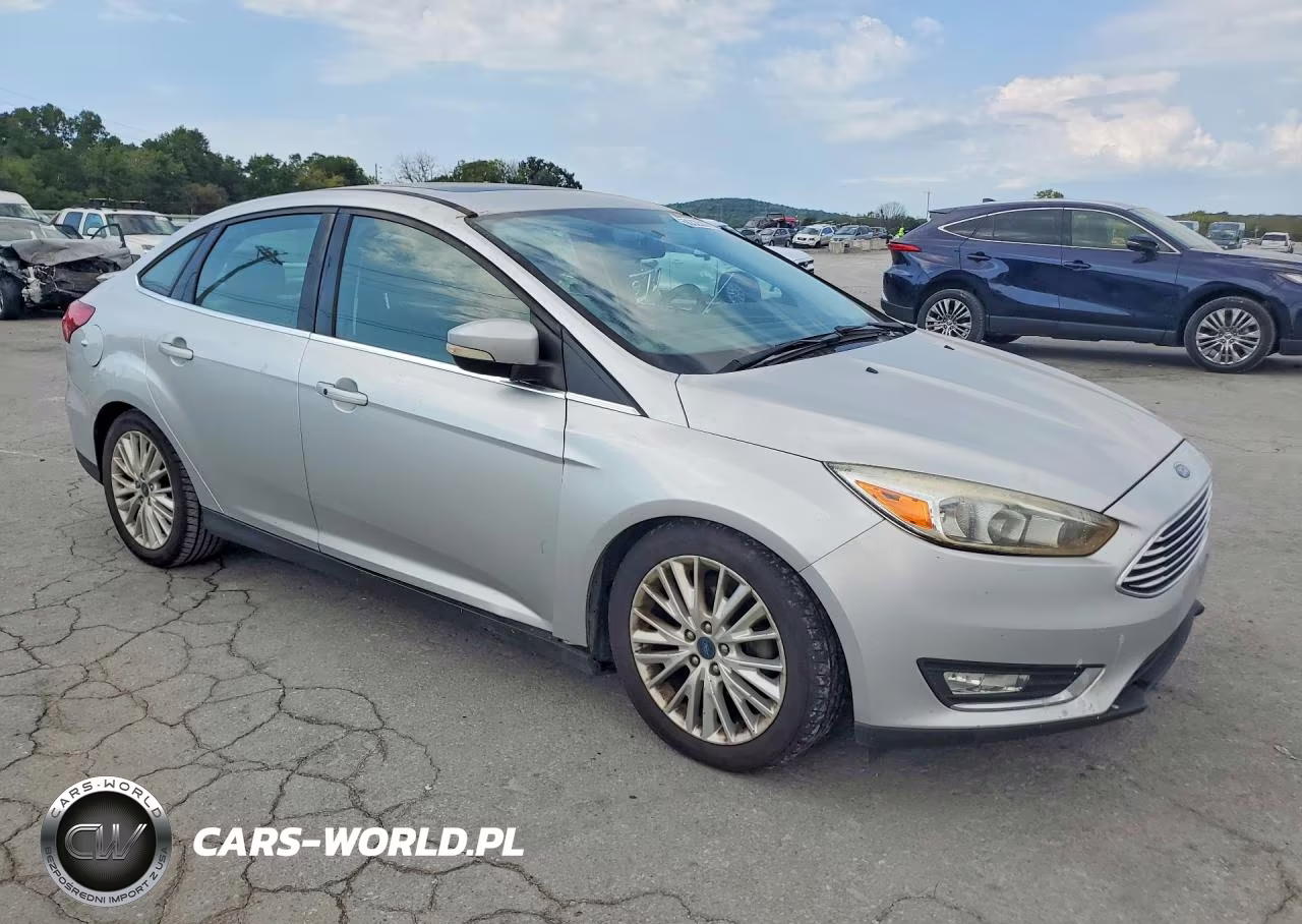 2017 Ford Focus Titanium VIN:1FADP3J21HL280011 - 4