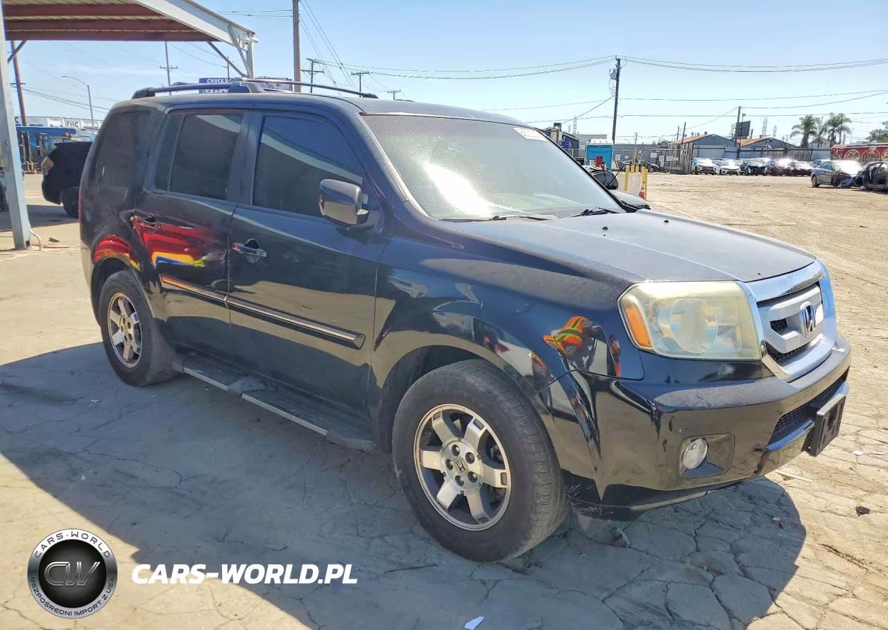2011 Honda Pilot Touring VIN:5FNYF3H97BB049688 - 4