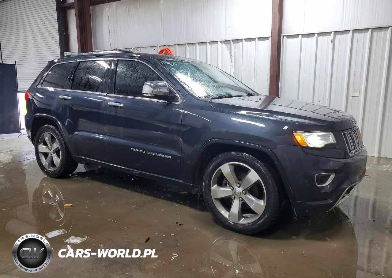 2015 Jeep Grand Cherokee Overland VIN:1C4RJFCG7FC665663 - 4