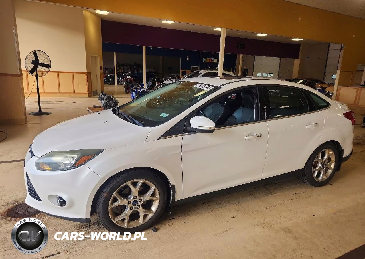 2013 Ford Focus Titanium VIN:1FADP3J28DL368094 - 1